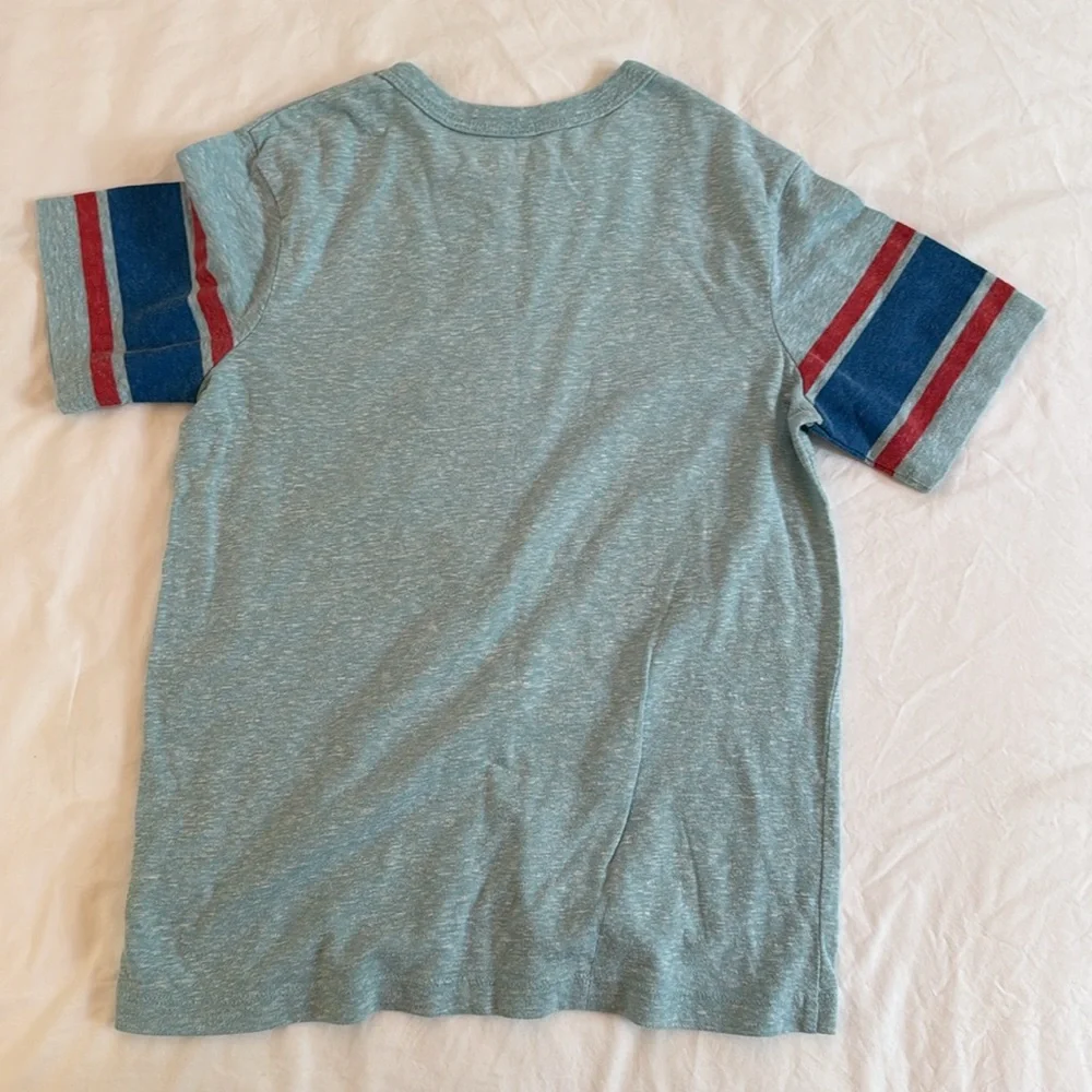 Size 8, Oshkosh T-shirt. Number 18.